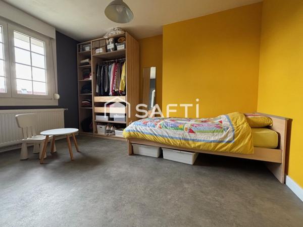 A proximité du centre ville , jardin public ..4 chambres ,garage