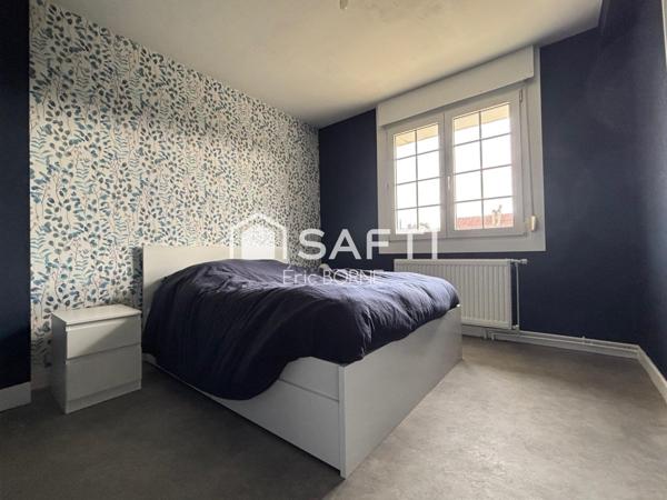 A proximité du centre ville , jardin public ..4 chambres ,garage