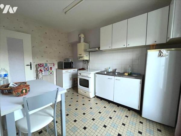 MAISON SEMI-MITOYENNE DE LOTISSEMENT