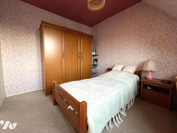 MAISON SEMI-MITOYENNE DE LOTISSEMENT