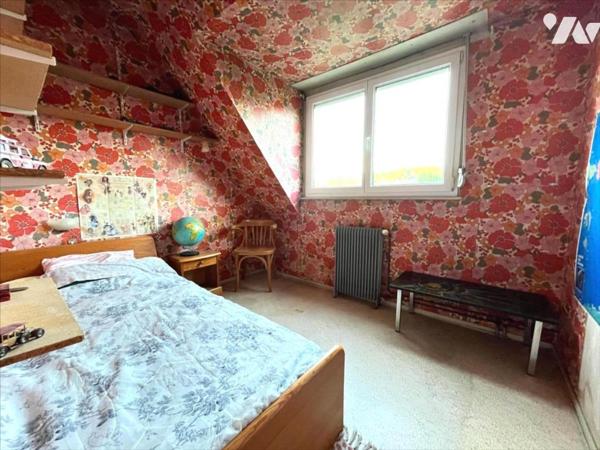 MAISON SEMI-MITOYENNE DE LOTISSEMENT