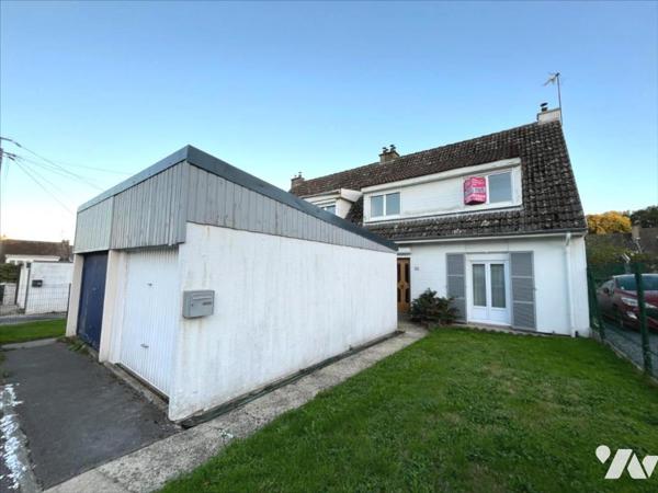 MAISON SEMI-MITOYENNE DE LOTISSEMENT