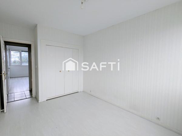 Appartement 2 chambres avec cave et place de parking