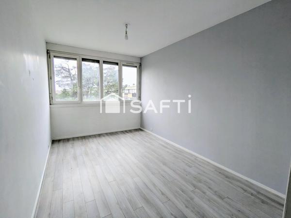 Appartement 2 chambres avec cave et place de parking