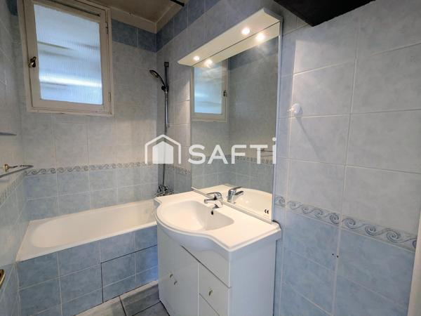 Appartement 2 chambres avec cave et place de parking