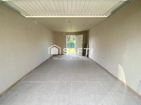 Maison de 101m2  de 2013 avec jardin et garage au calme.