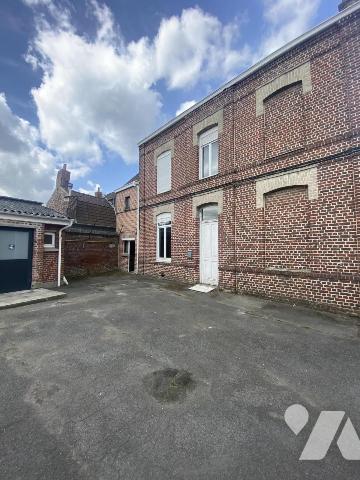 Ensemble immobilier sur environ 1 000 m² de terrain – Fort potentiel