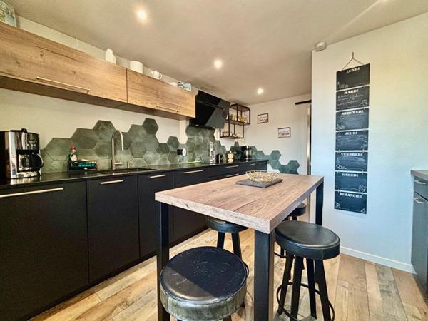 Appartement 63 m² avec terrain privatif et garage