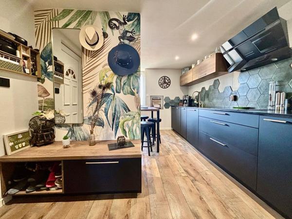 Appartement 63 m² avec terrain privatif et garage