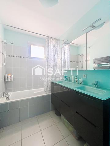 Une maison en triplex lumineuse dans un cadre privilégié.