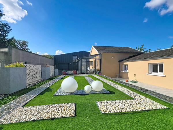 Maison a tinqueux avec parking et jardin