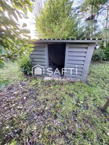 GRAND GARAGE EN PLEIN BOURG