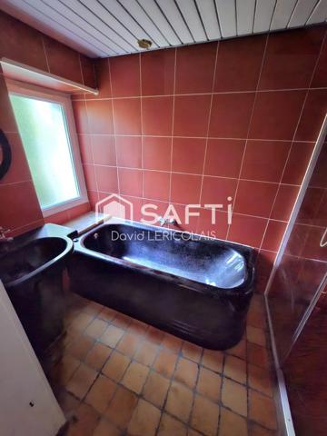 GRAND GARAGE EN PLEIN BOURG