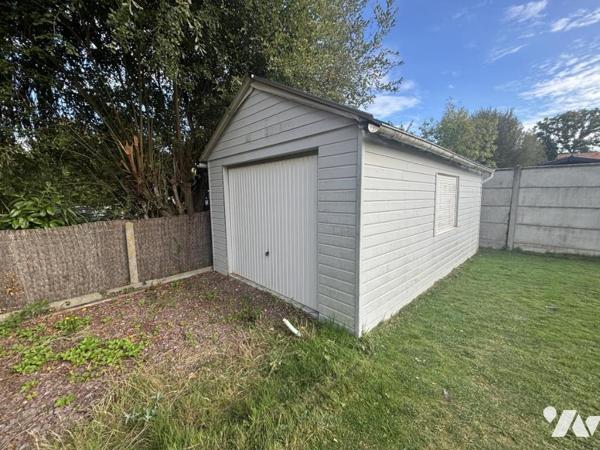SECTEUR MOUEN - MAISON D'HABITATION DE PLAIN-PIED AVEC JARDIN