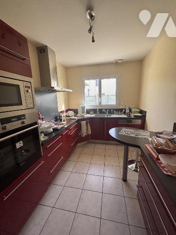 SECTEUR MOUEN - MAISON D'HABITATION DE PLAIN-PIED AVEC JARDIN