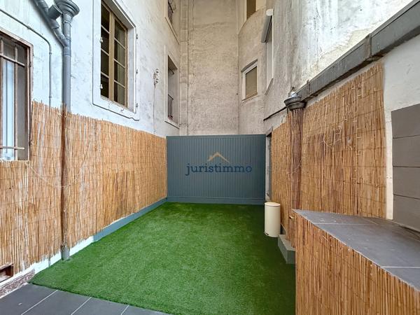 Orange (84100) BEL APPARTEMENT HAUSMANIEN LUMINEUX DE 158M² AVEC TERRASSE COUVERTE