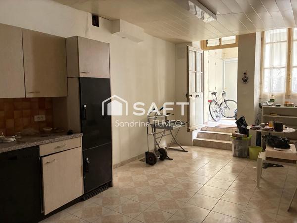 Appartement + Local Commercial avec Fonds de Commerce