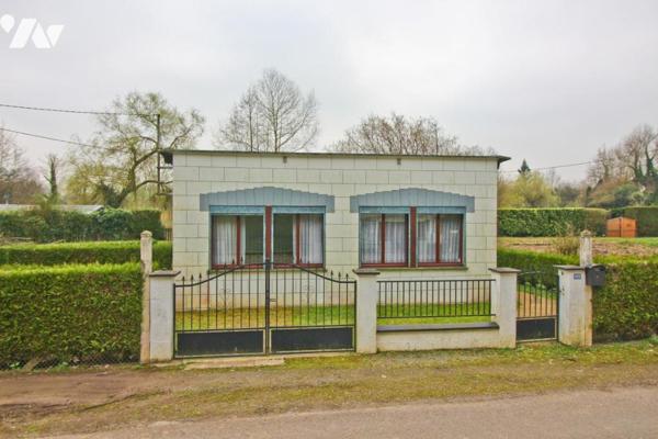 Maison de campagne et étang