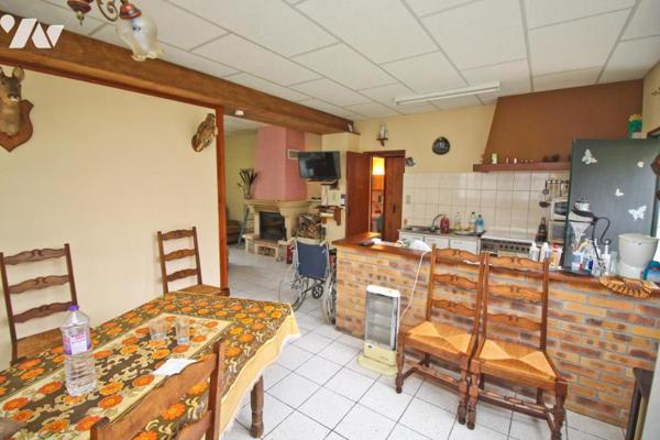 Maison de campagne et étang