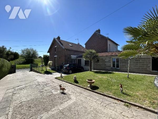 maison individuelle avec grand jardin et dépendances