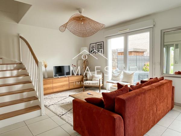 Maison semi individuelle – garage, jardin, parking