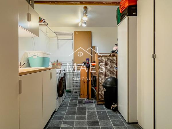 Maison semi individuelle – garage, jardin, parking