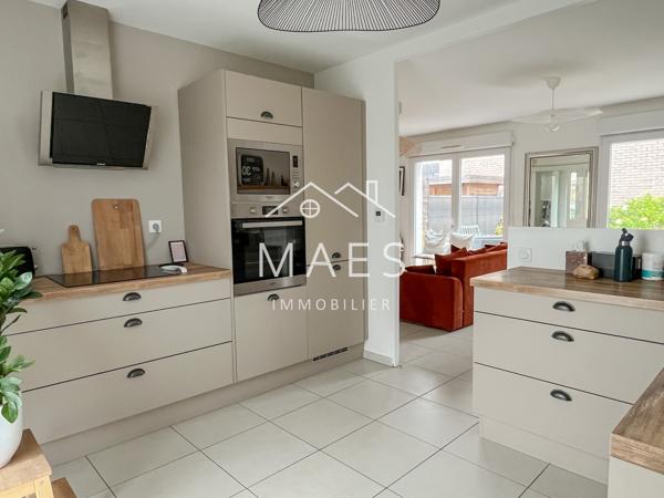 Maison semi individuelle – garage, jardin, parking