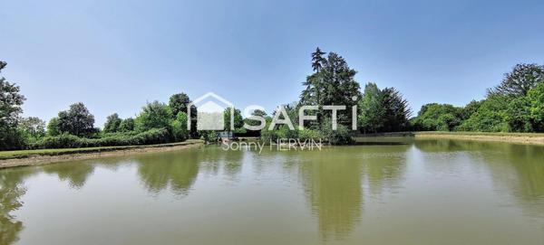 Étang avec mobil home, cabane et pêcherie