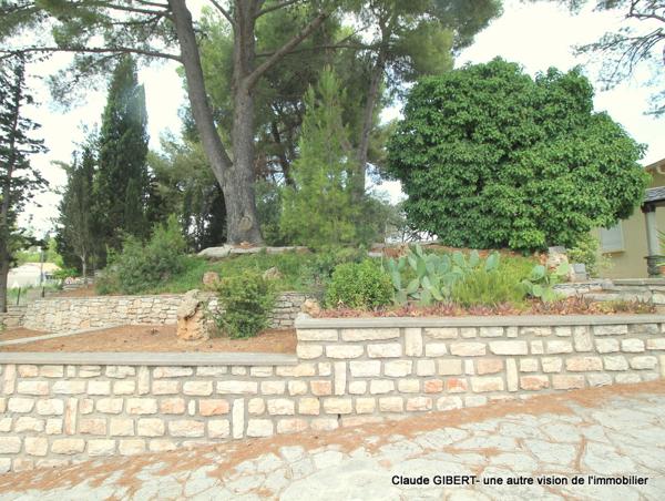 Maison de plain-pied d'environ 65 m2 sur une parcelle de 1275 m2 arborée à l'entrée de Bouzigues