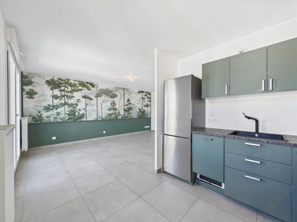 Appartement 4 pièces avec balcon et stationnements à Guénang