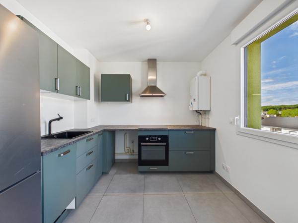 Appartement 4 pièces avec balcon et stationnements à Guénang