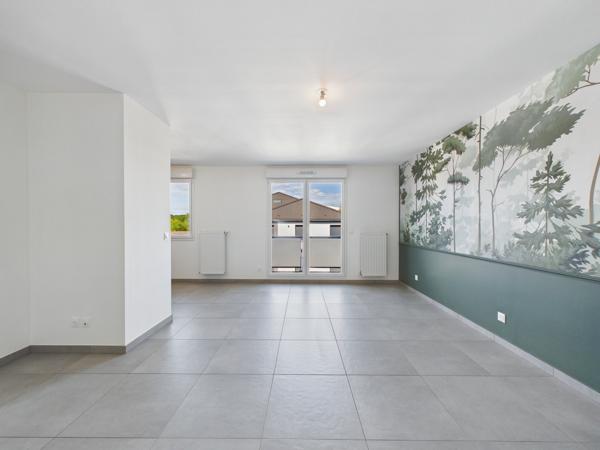 Appartement 4 pièces avec balcon et stationnements à Guénang