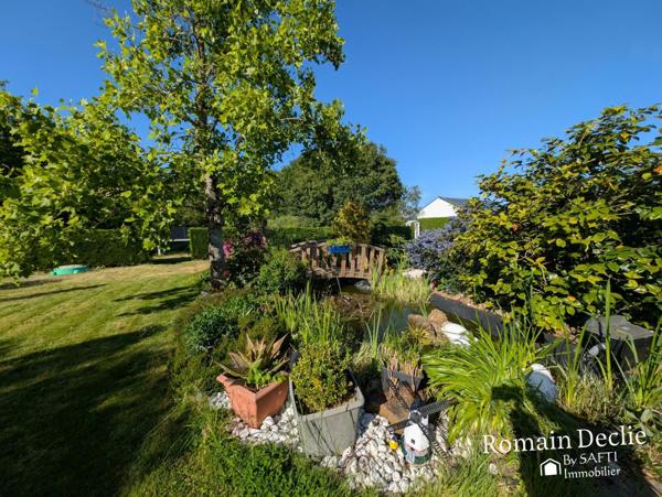 Pavillon de plain pied - 100m² - 3 chambres, grand terrain arboré et double garage