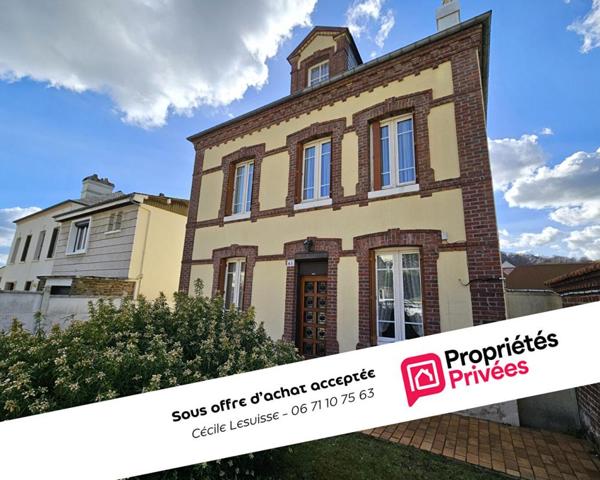 Maison proche du centre-ville avec grand terrain