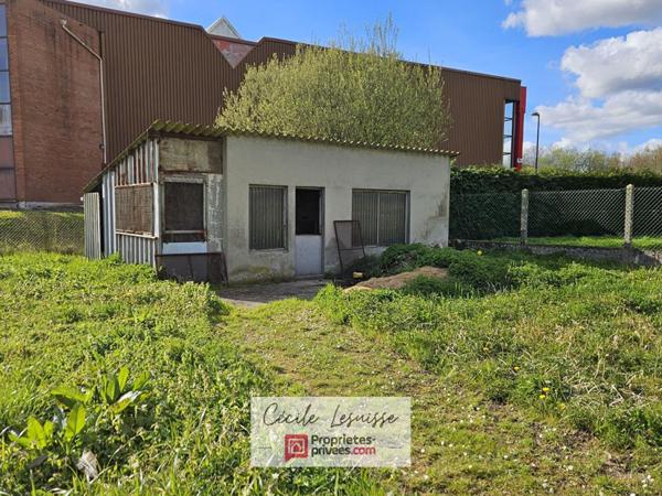 Maison proche du centre-ville avec grand terrain