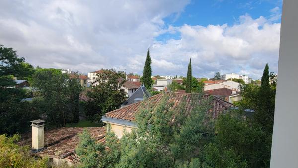 Appartement 4 pièces de 88 m2 avec balcons et box