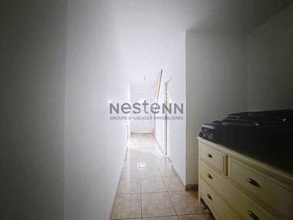 Maison à vendre à Segré d'environ 167m2 composée de 5 chambres, dont une au rez-de-chaussée, et un terrain de 1000m2