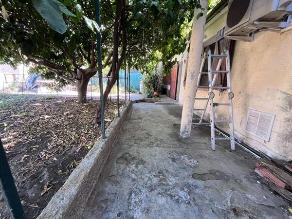 Charmante maison familiale de 230 m² avec double garage et jardin sur un terrain deux faces