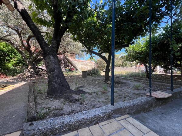 Charmante maison familiale de 230 m² avec double garage et jardin sur un terrain deux faces