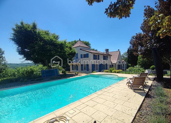 ✨ Nouveauté en exclusivité – Propriété coup de cœur assurée avec vue panoramique ✨
Perchée dans un cadre naturel d’exception de plus de 2,8 hectares de terrain, cette propriété offre un panorama spectaculaire sur Lalinde et ses environs à seulement 2 minutes des commodités. Ici, la vue devient une véritable signature : un panorama grandiose, omniprésent depuis la maison, les terrasses et la piscine.
Cette propriété aux prestations de qualité séduira les amateurs d’espace, de confort et de nature.
La maison bénéficie d’équipements performants et récents :
• Chauffage central par pompe à chaleur géothermique avec chaudière fioul en relais
• Double vitrage bois et PVC avec moustiquaires
• Volets battants en bois installés en 2022
• Deux cheminées
• Deux adoucisseurs d’eau
• 24 panneaux solaires dont 12 dédiés à la consommation et 12 à la revente (revenu annuel d’environ 1 300 €)
• Assainissement par micro-station
• Toiture entièrement refaite entre 2014 et 2020
• Piscine à débordement rénovée en 2024 avec volet électrique neuf
L’accès à la propriété se fait par un chemin bitumé menant à un vaste espace de stationnement.
La maison se compose de :
• Un hall d’entrée
• Une spacieuse cuisine avec îlot central et accès direct à la terrasse plein sud
• Un cellier / buanderie
• Un salon chaleureux
• Une salle à manger
• Un grand bureau
• 5 chambres de 9 à 14 m²
• 3 salles d’eau
• 3 WC
À l’extérieur, vous profiterez d’une immense terrasse faisant le tour de la maison, en partie couverte, permettant d’admirer pleinement le panorama ainsi que le superbe jardin à la française.
Deux enclos en panneaux rigides pourront accueillir animaux, potager ou tout autre projet selon vos envies.
Un bâtiment indépendant de 108 m² avec trois accès complète l’ensemble.
Enfin, vous serez séduits par la magnifique piscine chauffée au sel, à débordement, de 9 x 5 mètres, sécurisée par un volet électrique.
Une propriété rare sur le secteur, alliant confort moderne, volumes généreux et cadre de vie exceptionnel.
Visite 7 jours sur 7 . Collaboration entre professionnels de l'immobilier Ok.
✨ New exclusive property – Stunning property with panoramic views ✨
Perched in an exceptional natural setting of more than 2.8 hectares of land, this property offers a spectacular view of Lalinde and its surroundings just 2 minutes from amenities. Here, the view becomes a true signature: a grandiose panorama, omnipresent from the house, the terraces and the swimming pool.
This property with quality services will seduce lovers of space, comfort and nature.
The house benefits from high-performance and recent equipment:
• Central heating by geothermal heat pump with oil boiler in relay
• Double glazing, wood and PVC with mosquito nets
• Wooden shutters installed in 2022
• Two fireplaces
• Two water softeners
• 24 solar panels, including 12 dedicated to consumption and 12 for resale (annual income of about €1,300)
• Sanitation by micro-station
• Roof completely redone between 2014 and 2020
• Infinity pool renovated in 2024 with new electric shutter
Access to the property is via a paved road leading to a large parking space.
The house consists of:
• An entrance hall
• A spacious kitchen with central island and direct access to the south-facing terrace
• A cellar / laundry room
• A warm living room
• A dining room
• A large office
• 5 bedrooms from 9 to 14 m 2
• 3 shower rooms
• 3 toilets
Outside, you will enjoy a huge terrace around the house, partly covered, allowing to fully admire the panorama and the beautiful French garden.
Two enclosures in rigid panels can accommodate animals, vegetable garden or any other project according to your desires.
An independent building of 108 m2 with three accesses completes the whole.
Finally, you will be seduced by the magnificent salt-heated infinity pool of 9 x 5 meters, secured by an electric shutter.
A rare property in the area, combining modern comfort, generous volumes and exceptional living environment.
Visit 7 days a week. Collaboration between real estate professionals Ok.