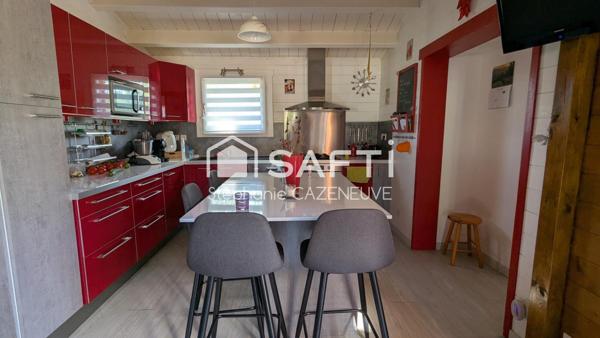 Charme, confort, double garage et fonctionnalité