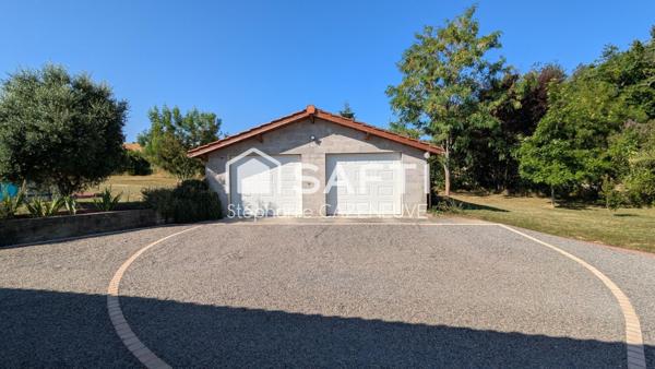 Charme, confort, double garage et fonctionnalité