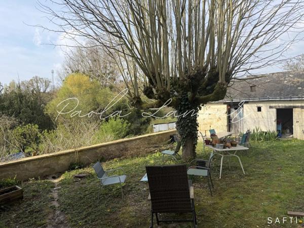 Cadre verdoyant et paisible pour cette charmante maison