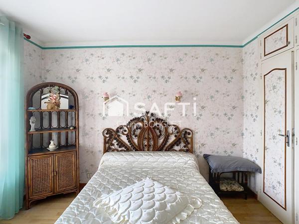 Maison R+1 avec double garage et jardin