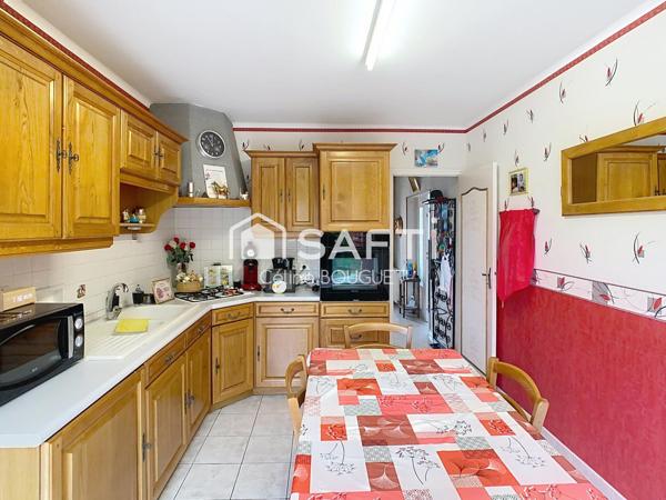 Maison R+1 avec double garage et jardin