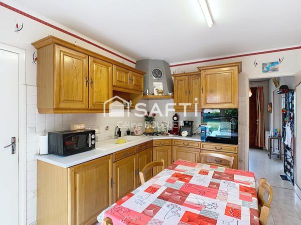 Maison R+1 avec double garage et jardin