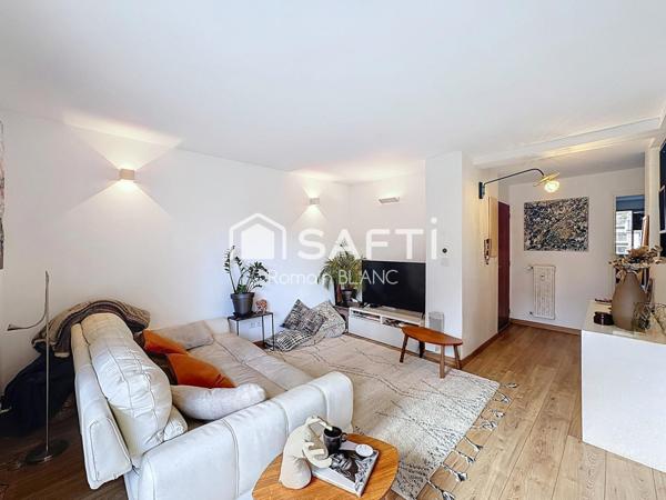 Superbe appartement 4 pièces avec balcon, parking et cave