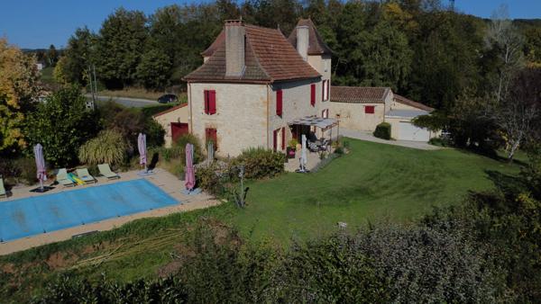 Propriété en pierre avec grange et belle vue centre Prayssac