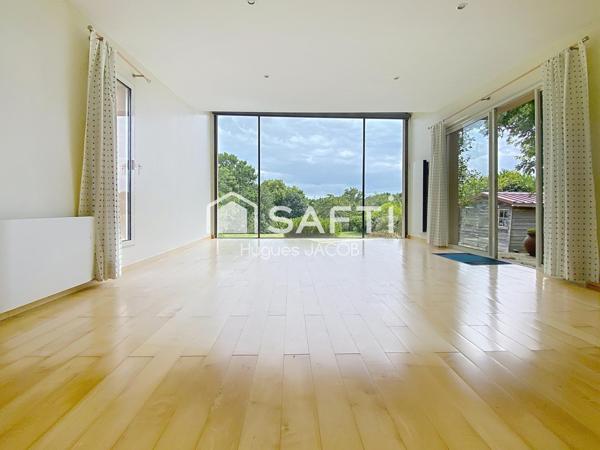 Maison d'architecte avec 5 chambres, grand jardin et sous-complet