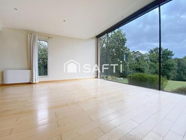 Maison d'architecte avec 5 chambres, grand jardin et sous-complet